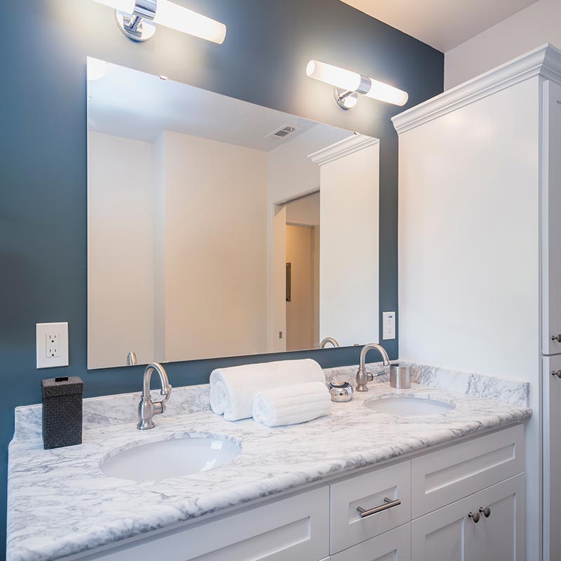 Bathroom Mirror with White Granite Countertop