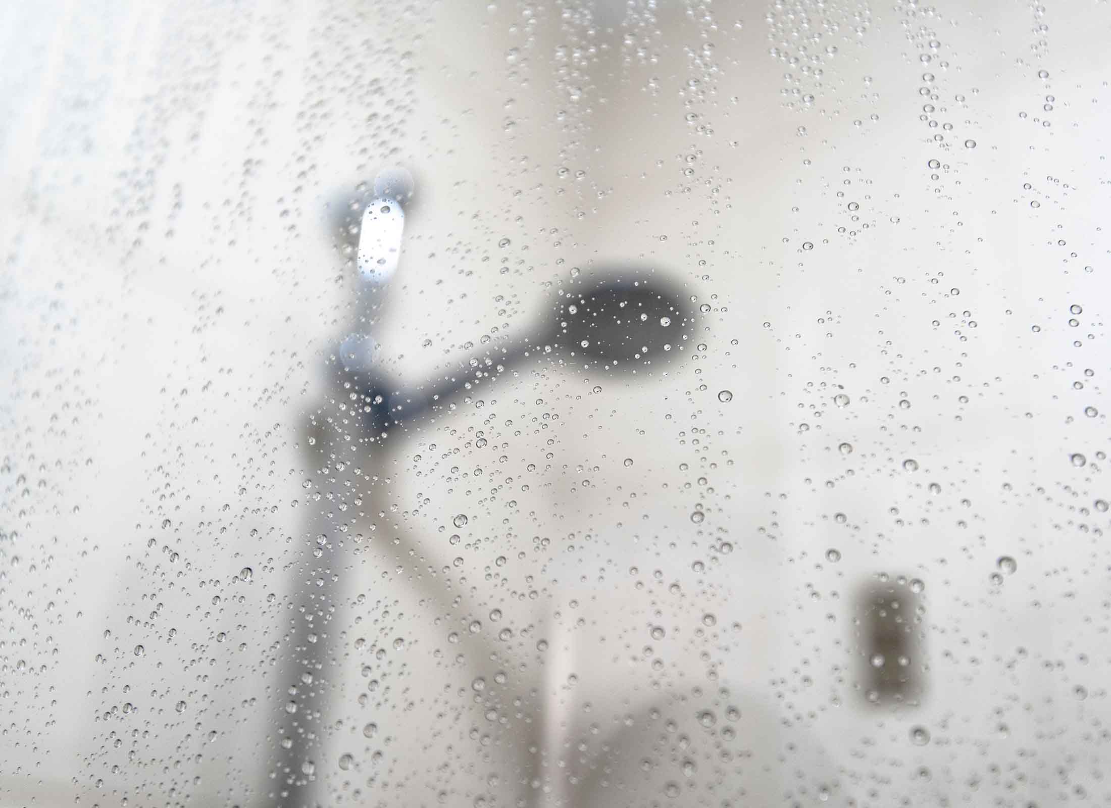 Beads Of Water On Shower Glass Door