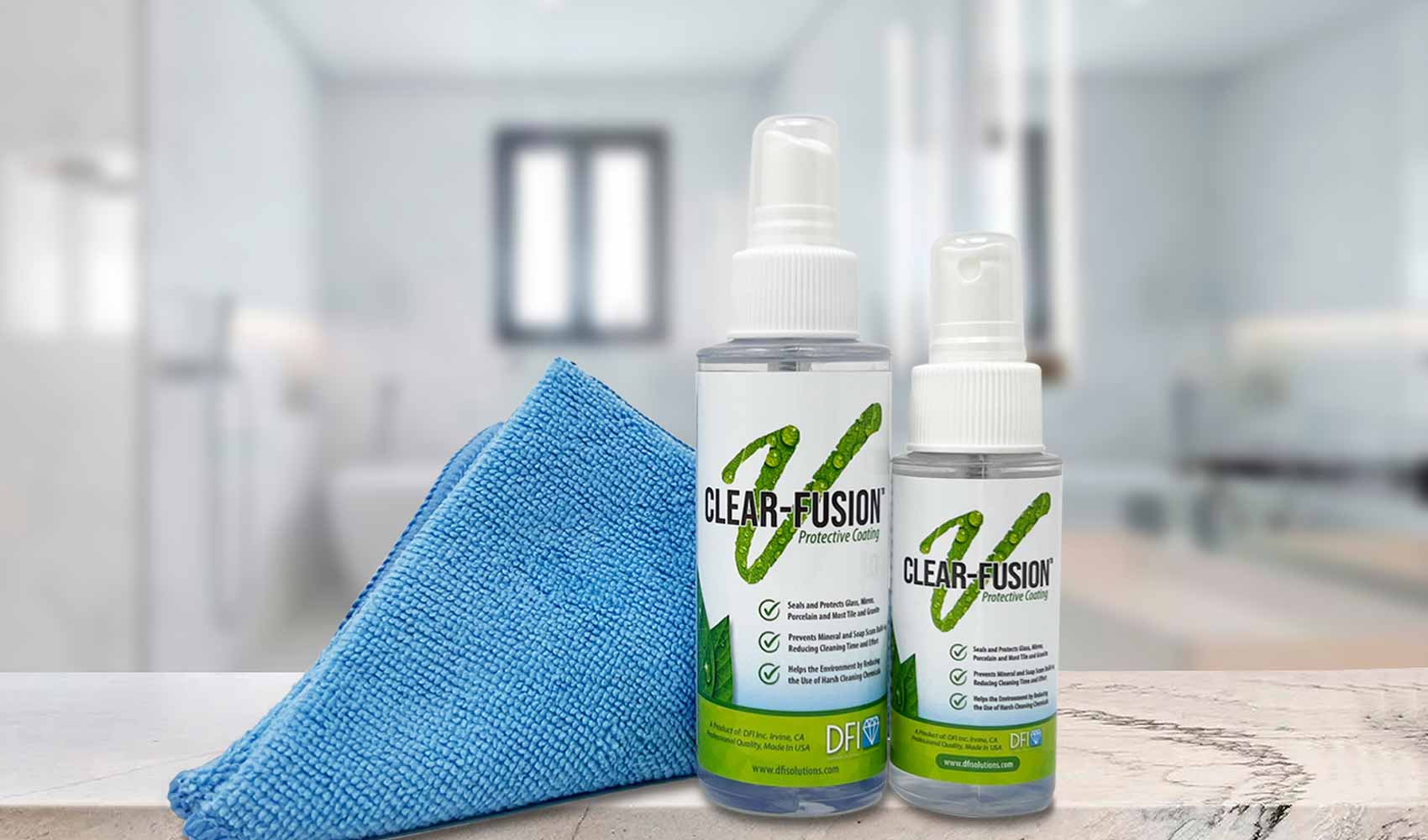 Clear-Fusion V Bottles with Microfiber Towel on Blurred Bathroom Background